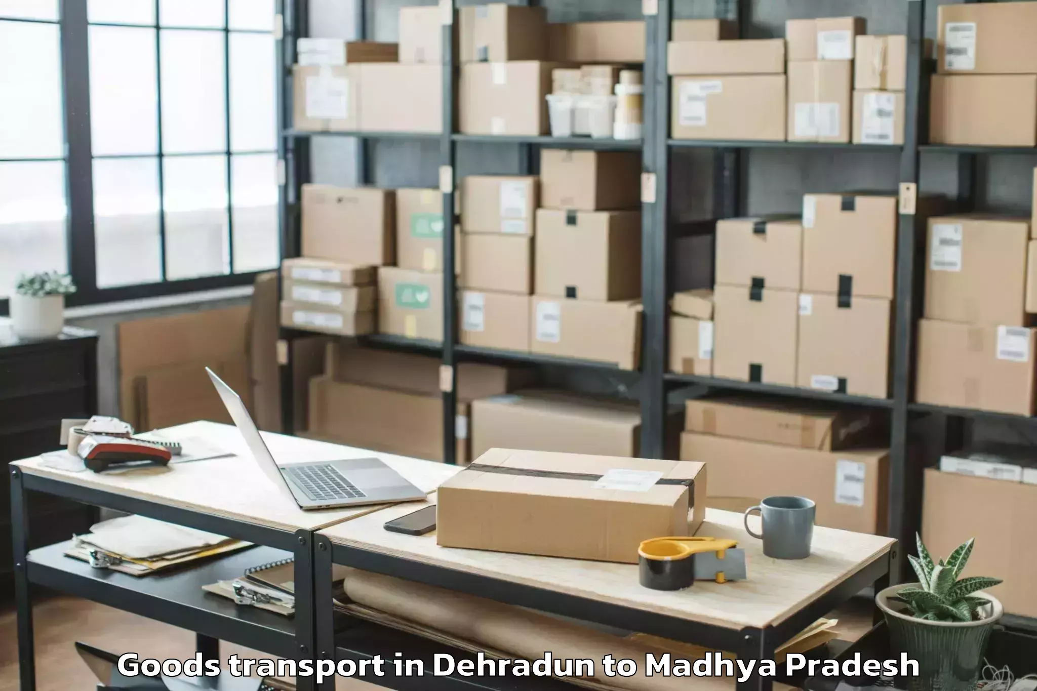 Book Your Dehradun to Biaora Goods Transport Today